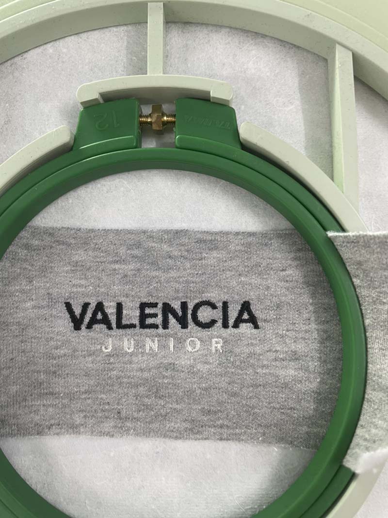 Thêu logo Công ty Valencia Junior 4 | Theu dong phuc